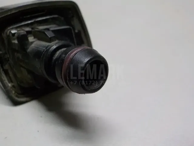 Форсунка омывателя фары