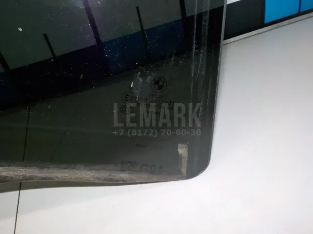Стекло двери задней левой