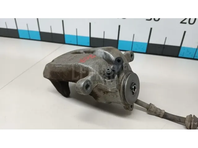 Суппорт тормозной задний левый
