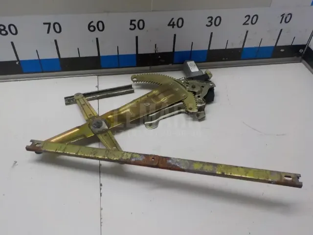 Стеклоподъемник электр. задний левый
