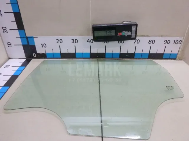 Стекло двери задней левой