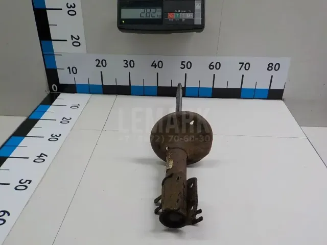Амортизатор передний левый