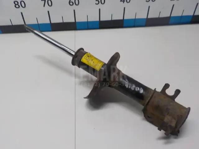 Амортизатор передний левый