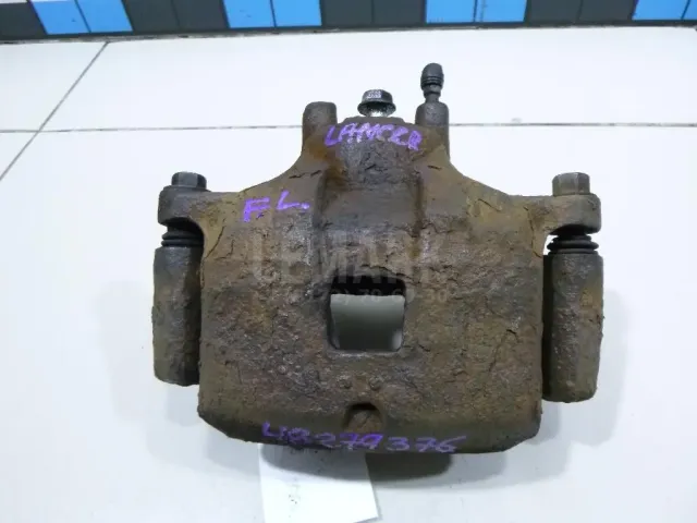 Суппорт тормозной передний левый для  Ford Ranger 2006-2012