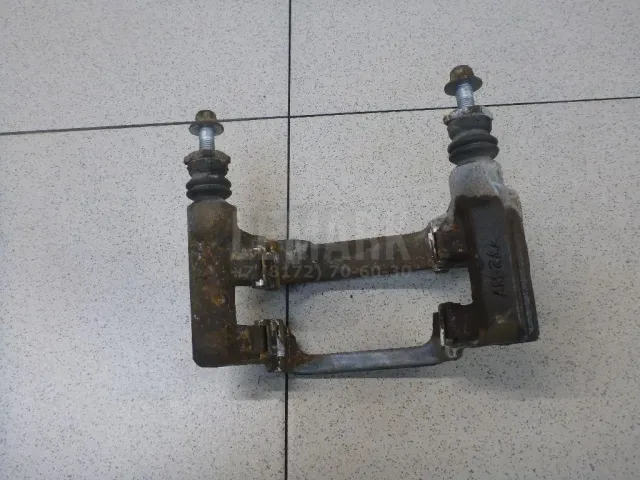 Скоба суппорта заднего правого для  Honda Accord V 1996-1998