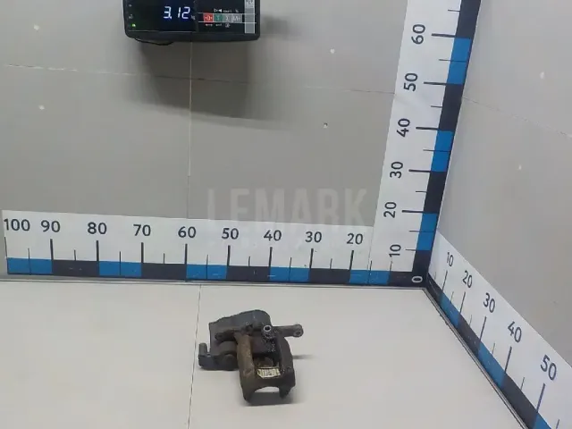 Суппорт тормозной задний левый