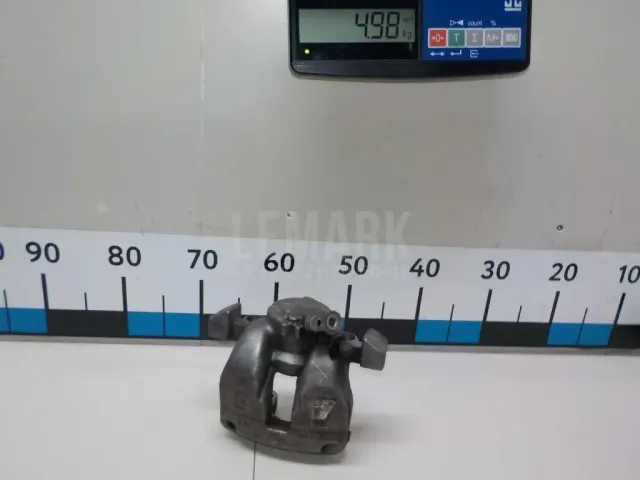 Суппорт тормозной передний левый