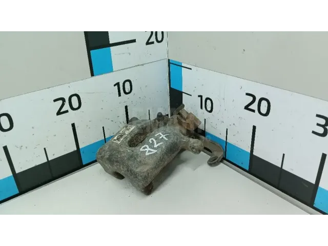 Суппорт тормозной задний левый