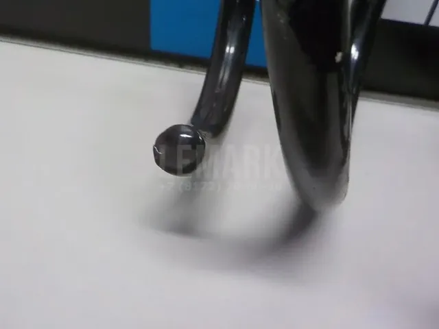 Пружина передняя