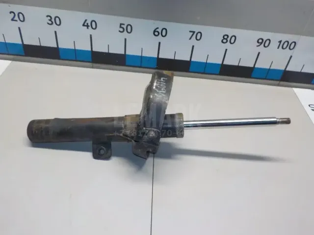 Амортизатор передний левый