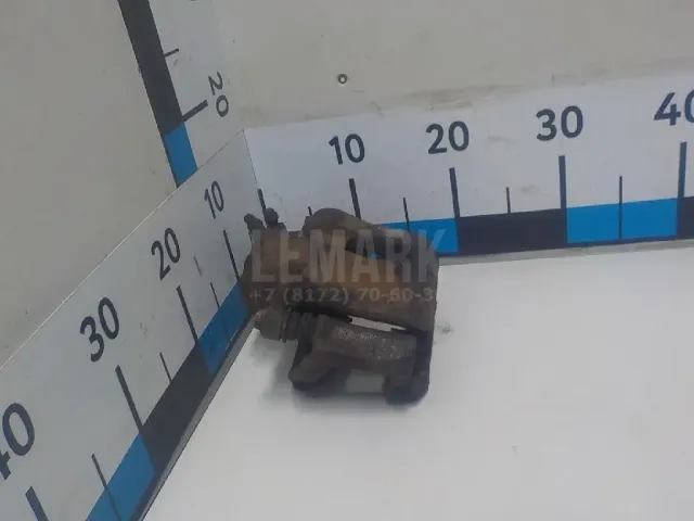 Суппорт тормозной передний левый