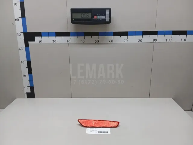 Отражатель в бампер задний левый