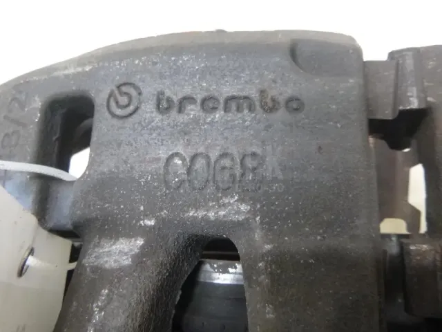 Суппорт тормозной передний левый для  Daewoo Rezzo 2000-2011