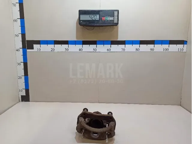 Суппорт тормозной передний левый