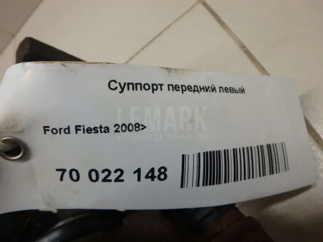 Суппорт тормозной передний левый