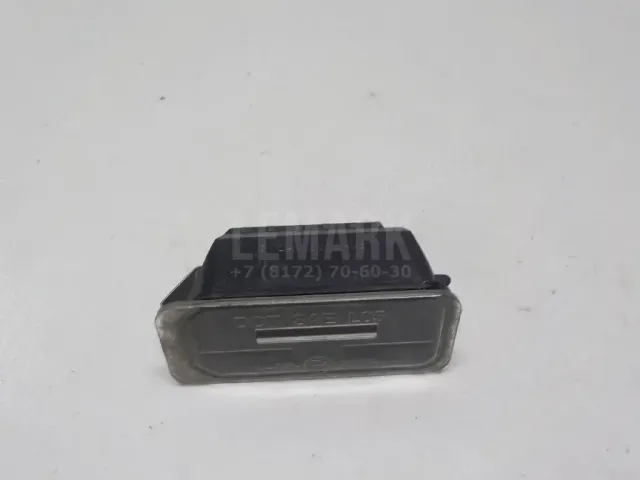 Фонарь подсветки номера для  Ford Cougar 1998-2001