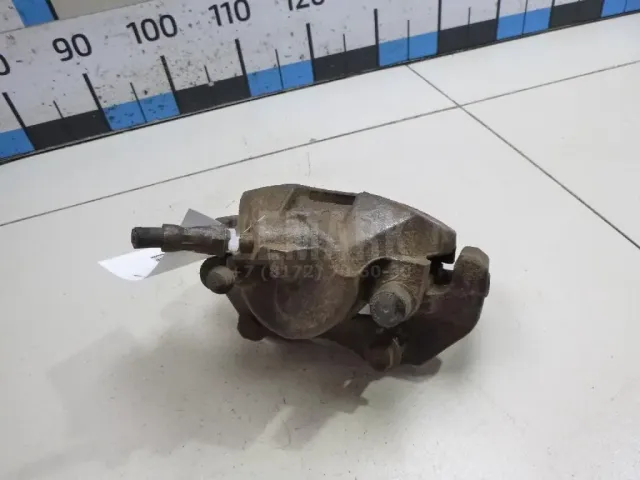 Суппорт тормозной передний левый