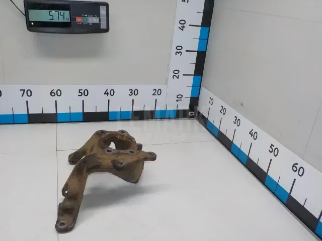 Кулак поворотный задний левый