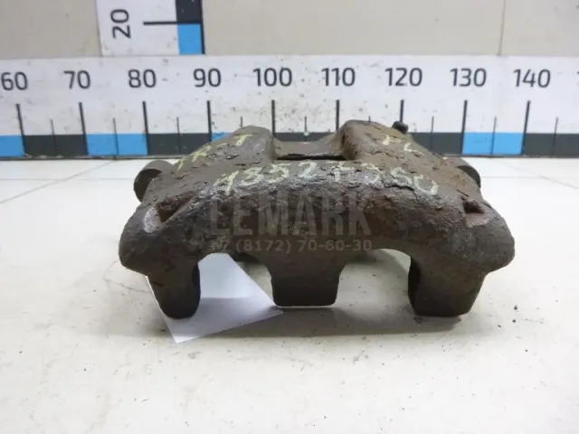Суппорт тормозной передний левый