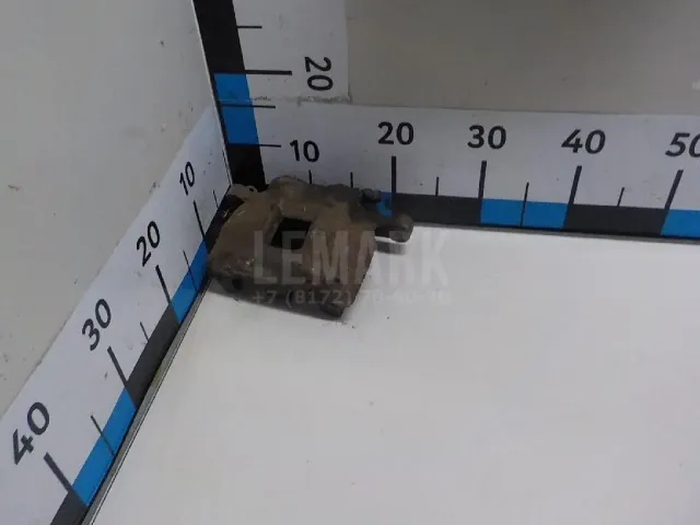 Суппорт тормозной передний левый